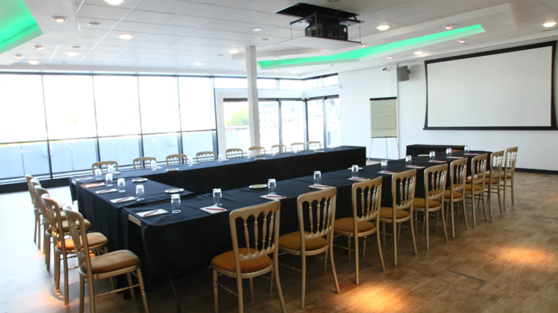 m shed u shaped meeting table setup